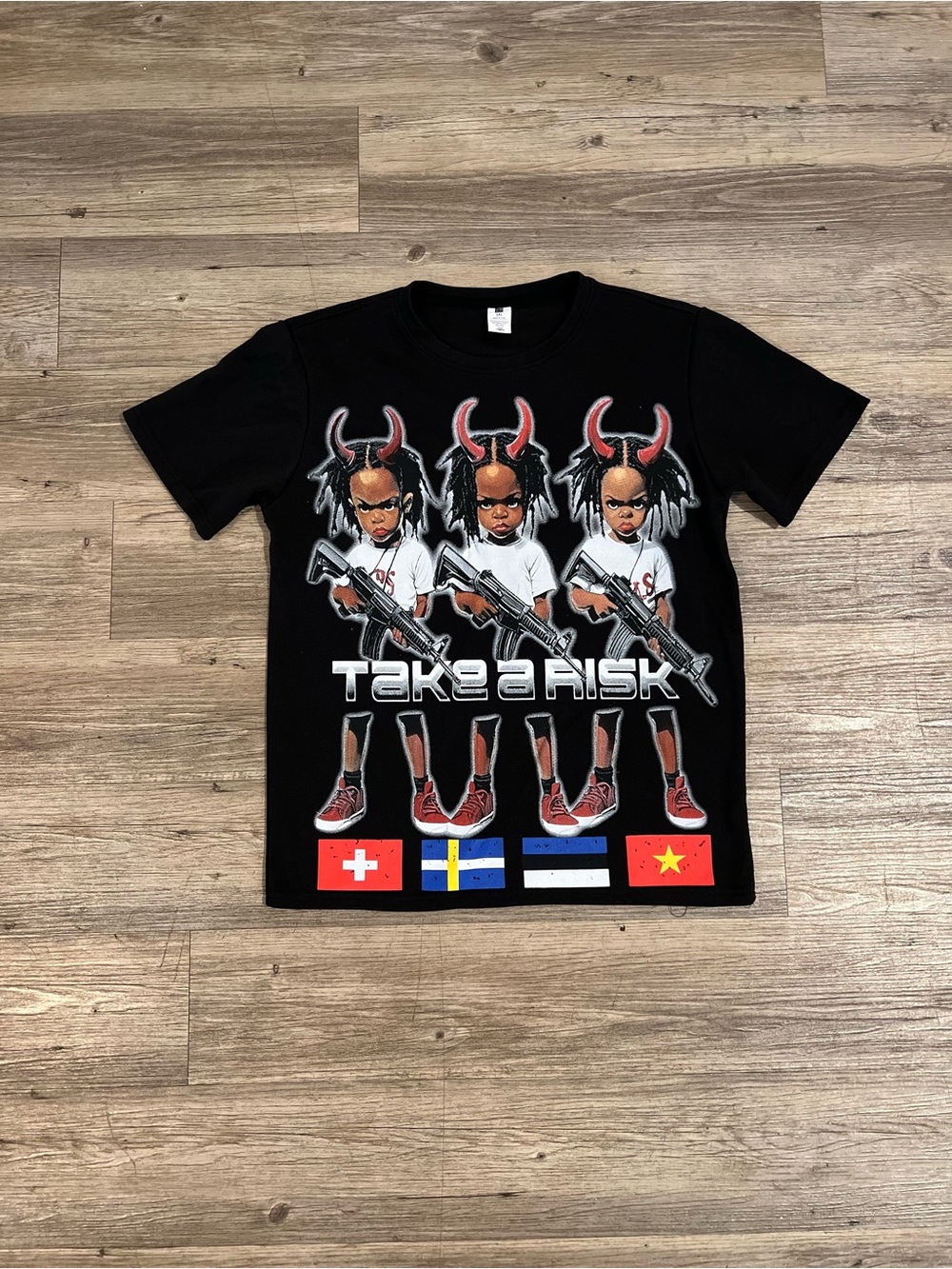 Take a Risk Black cotton t-shirt with graphic figures with horns holding guns 3X